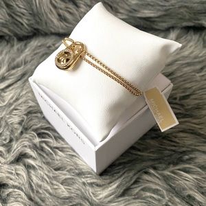 NWT authentic MK gold plated padlock charm adjustable bracelet